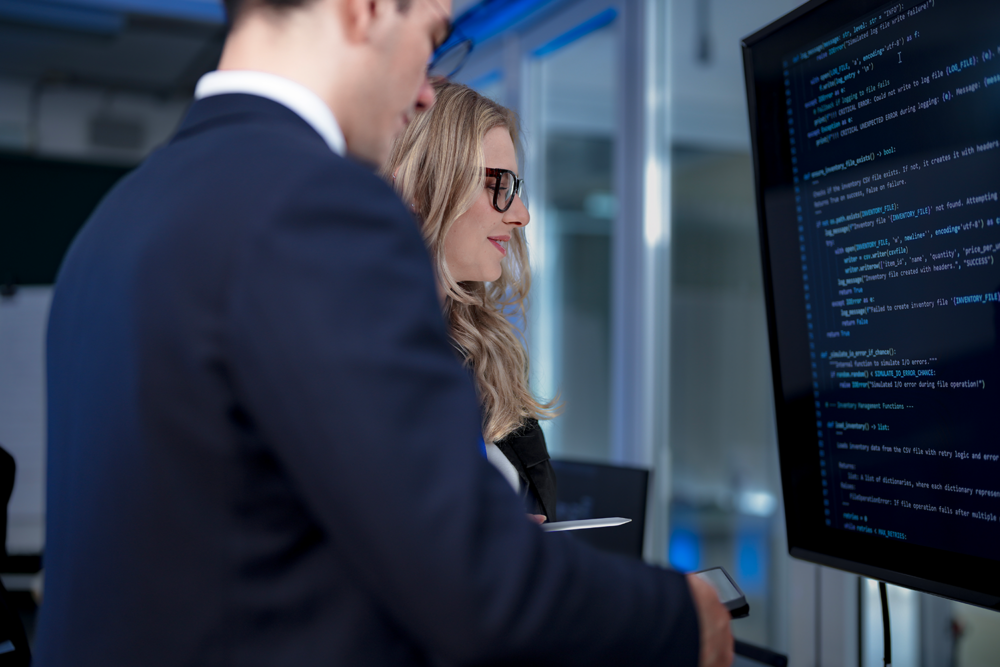 A female developer performing a code review. Highlighting technical expertise and contributions of women in technology.
