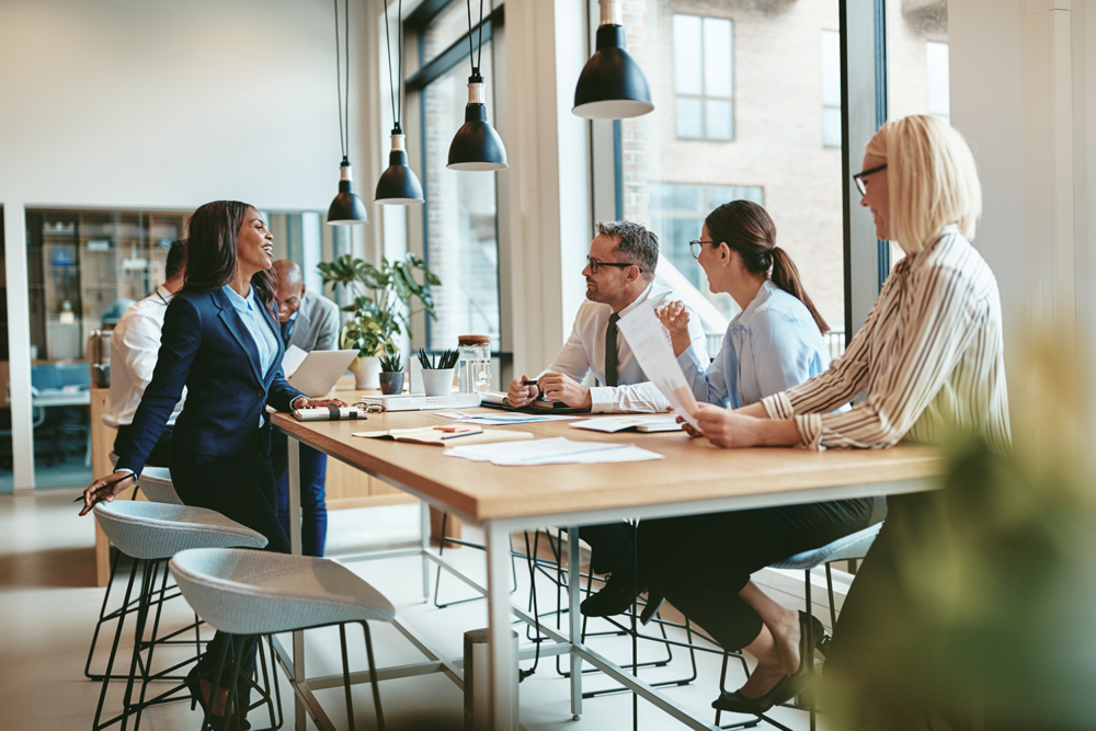Modern office setting where recruiters assess fp&a skills and communication during a candidate interview for a financial planning and analysis role.