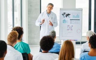 A clinical expert presenting global data to medical professionals. Best practices in recruitment life sciences focus on continuous education.